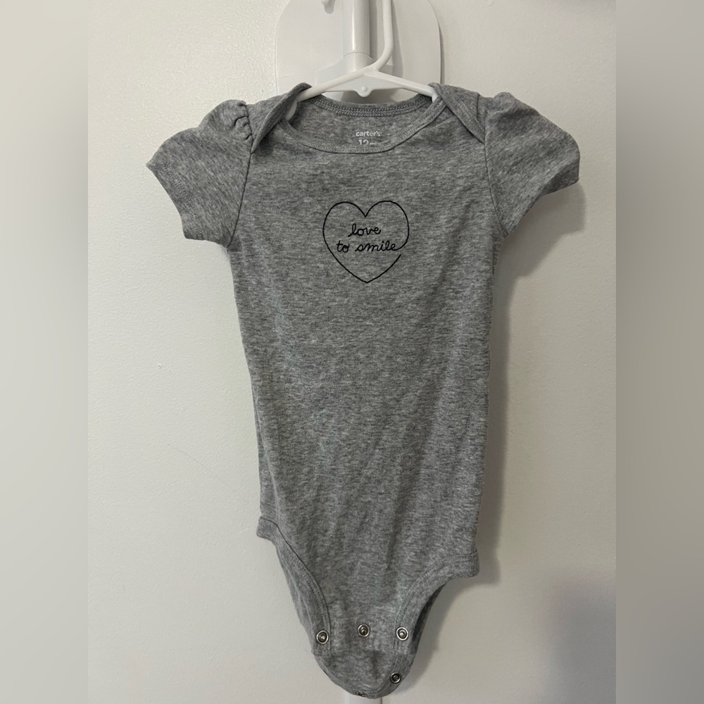 Carters baby girl “ love to smile “ onesie